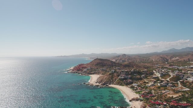 Aerial of resorts and homes along shoreline in Jose Del Cabo, Mexico