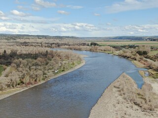 Aerial of RV camping along shores of Yellowstone River near Billings, Montana in spring