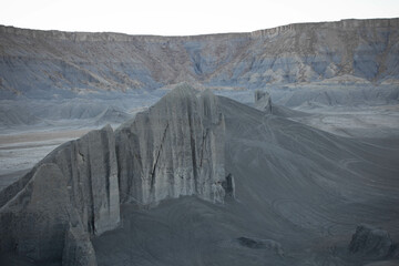 Bentonite fins in grey landscape in Caineville, Utah