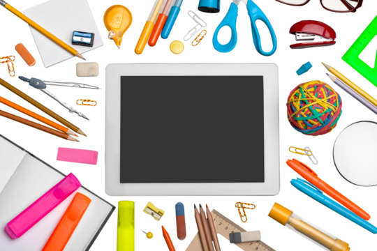 Digital tablet and various multi-colored stationery.