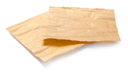 Baking paper isolated. Crumpled pieces of brown parchment or baking paper on white background. Design element.