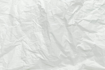 Crumpled white paper, top view.