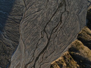 Top down aerial of flood plain in Bolivian mountains