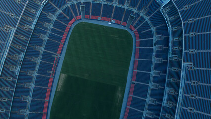 Top down aerial of stadium seating at football arena