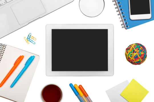 Office desk with digital tablet and office supplies