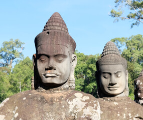 Sculptural stone group of guard soldiers at the gates of the ancient Angkor Wat is a temple complex in Cambodia