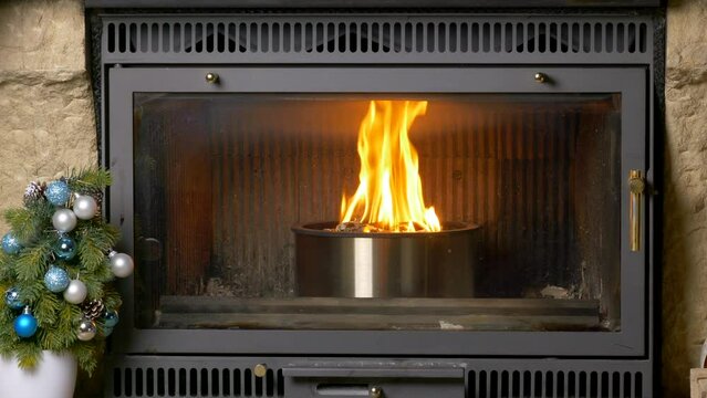 The fireplace burns with a special pellet cast iron bowl. High quality 4k footage
