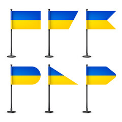 Realistic various Ukrainian table flags on a black steel pole. Souvenir from Ukraine. Desk flag made of paper or fabric, shiny metal stand. Mockup for promotion and advertising. Vector illustration