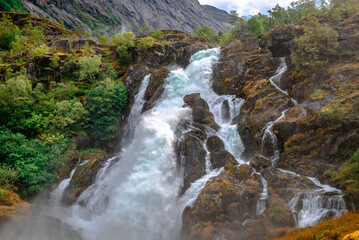 Kleivafossen, a waterfall located near Briksdal and the Brikdal glacier, in Jostedalsbreen National Park, Norway.