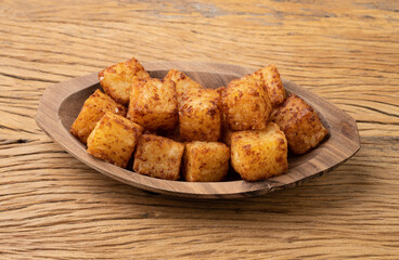 Tapioca dice, typical northeast brazilian food over wooden table