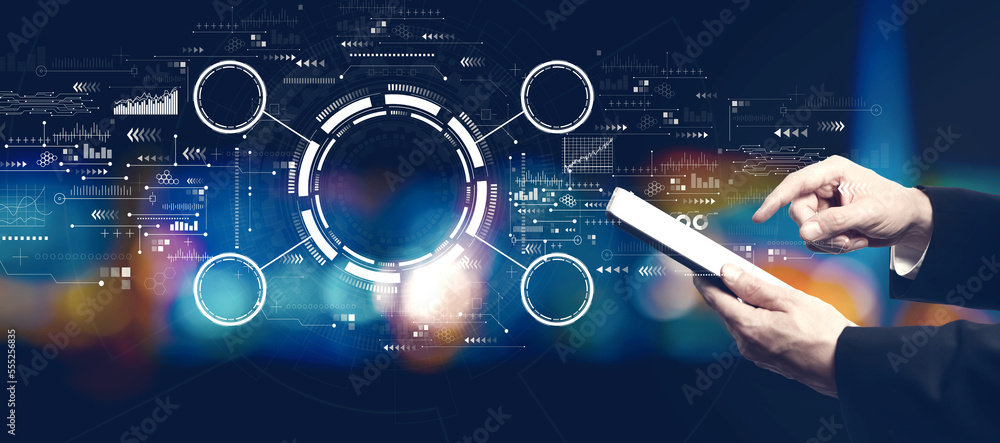 Poster tech circle with businessman using a tablet computer at night