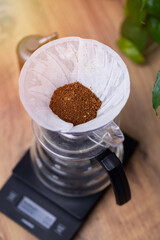 ground coffee, ground coffee on precision scale, ready-to-brew coffee