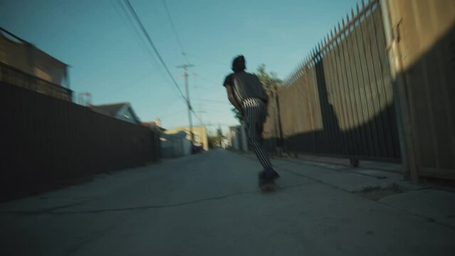 Mexican American Punk Rocker Skateboarding Alleyway 