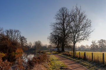 Winter landscape view of white frost in morning, Nature path along the Kromme Rijn river (Crooked...