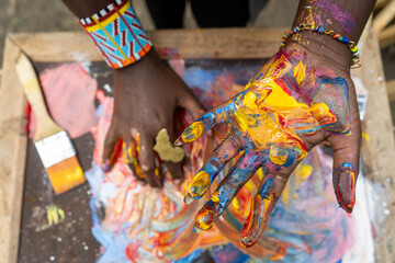 female artist hands after painting