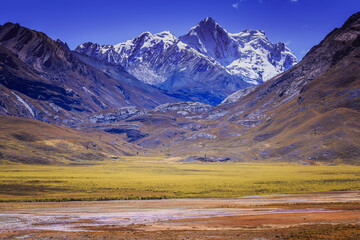 Secluded lake in Cordillera Blanca, snowcapped Andes, Ancash, Peru