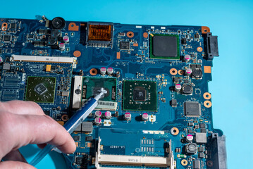 replacement of thermal paste in the cooling system on the laptop computer board