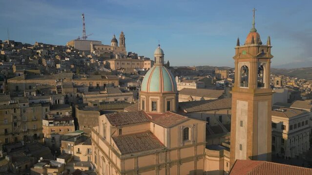 wider flying counter clockwise around Cathedral of San Giuliano in Caltagirone Sicily