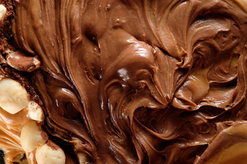 Mixture of macadamia nuts, peanut butter sauce  and cocoa powder