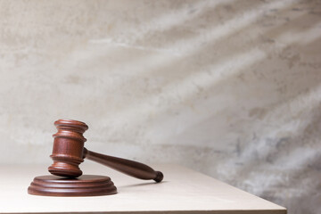 Law and justice concept. Mallet gavel of the judge, scales of justice, books. Copy space for text
