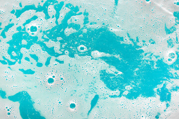 Color water with foam as background