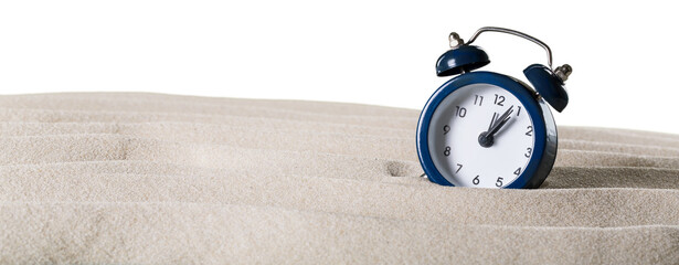 Alarm clock on the sand