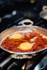 pan fried eggs in tomato turkish menemen