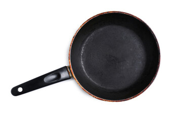 Dirty old frying pan on white background, top view