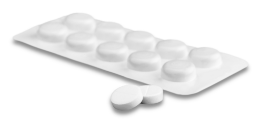 White medical capsules and pills in a blister