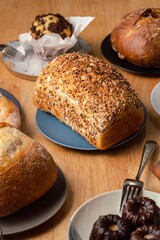 Healthy wholemeal bread on wooden table.