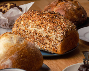 Healthy wholemeal bread on wooden table.