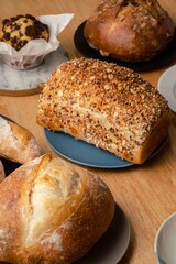 Healthy wholemeal bread on wooden table.