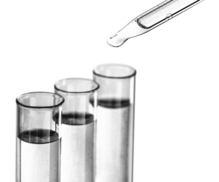 Liquid drop from laboratory glass pipette to the test tube