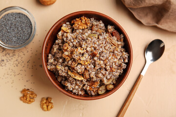 Bowl of Kutya on beige table, closeup
