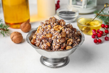 Bowl of Kutya on white table, closeup