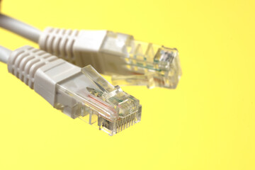 Network connection, internet connection and computer technology concept, close-up of ethernet cable...