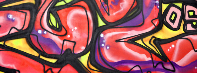 Colorful background of graffiti painting artwork with bright aerosol strips and beautiful colors....