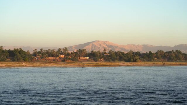 Beautiful Nile River with Sahara Desert Mountain Background