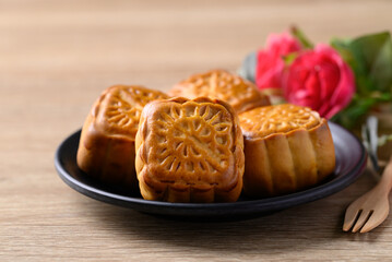 Obraz na płótnie Canvas Chinese moon cake, traditional dessert celebrating in Chinese festival mid autumn or new year