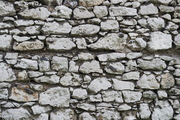 stone masonry grey wall background. stone masonry grey wall backdrop. background stone masonry