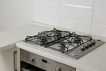 New gas stove and oven in stylish kitchen