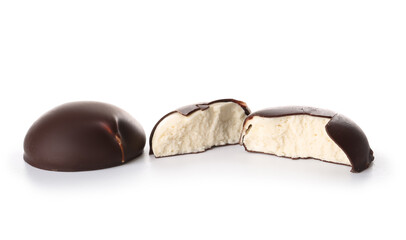 Delicious bird's milk candies on white background