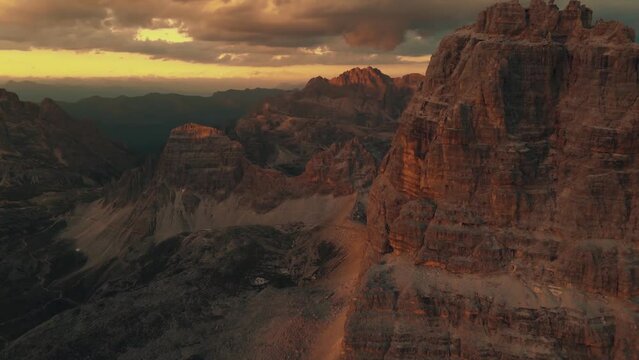 Aerial view beside a one of the bigest Mounatin  of the Pale di San Martino mountain group in sunset time. Dolomites, Italy.