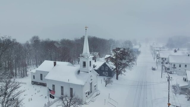 Heavy snowfall surrounds Monson community church