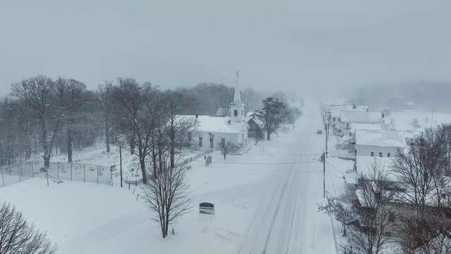 Monson community church in heavy snowfall Realtime Aerial