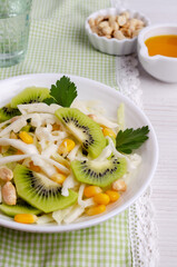 Fresh vegetables salad with kiwi