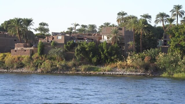 Moving Panning shot of Nile River Banks an Farms in Luxor, Egypt