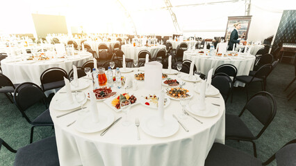 served tables in the Banquet hall of the restaurant