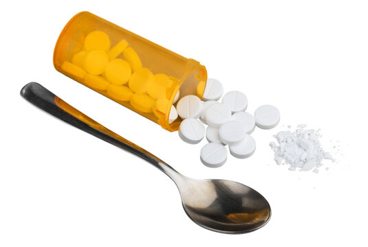 Medicines, supplements and drugs in a bottle with spoon