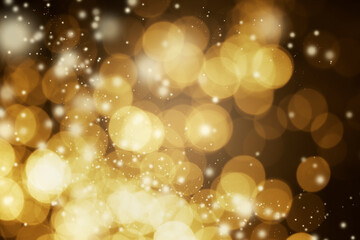 Beautiful Gold Bokeh Abstract Background. Celebration Christmas Festive New Year Theme, Xmas Holiday. Glitter Bokeh Defocused Lights, Dust and Stars. Golden with Dark or Black.